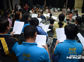 The policemen and soldiers of the country lend their time to perform for their fellow uniformed men.