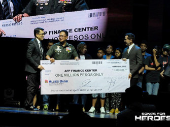 Gen. Gregorio Pio Catapang, the incumbent Chief of Staff of the Armed Forces of the Philippines, receives the Php 1 million-peso cheque from BMPI Chairman and CEO, Dr. Daniel Razon and Progressive Broadcasting Coporation President, Mr. Atom Henares.