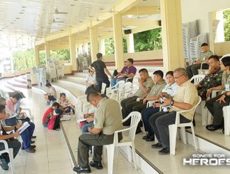 The organizers of Songs for Heroes 2 and the performers from the AFP gather at the AFP Grandstand in Camp Aguinaldo for a briefing about the concert.